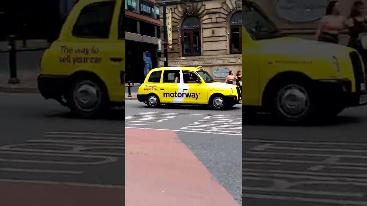 The Little Yellow Taxi Manchester England UK 2022