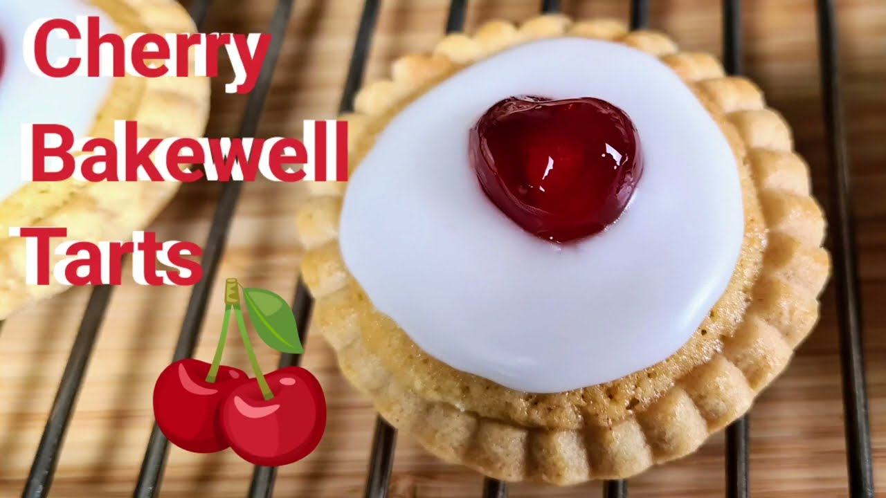 Tasty Little Valentine's Hearts on Cherry Bakewell Tarts...