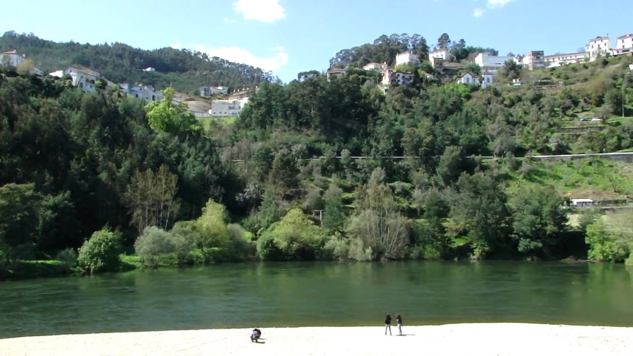 The hill town of Penacova Portugal  from the river beach 'praia fluvial'