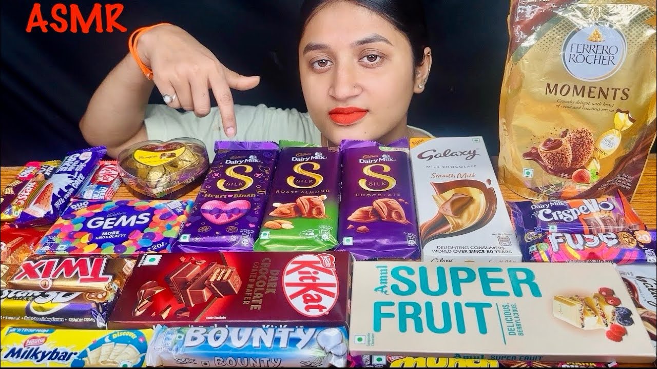 EATING FERRERO ROCHER MOMENTS,GALAXY,KITKAT,AMUL SUPER FRUIT,BOUNTY,TWIX,HEART BLUSH,CRISPELLO|FOOD