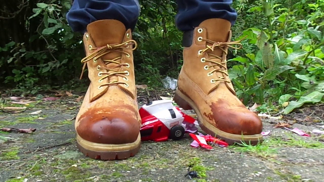 Timberland boots stomp, trample and destroy toy helicopter