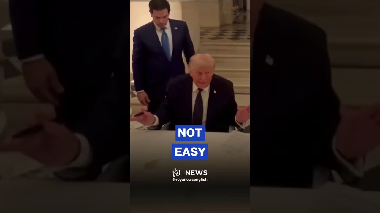 Macron shares video of Trump signing Iran deal