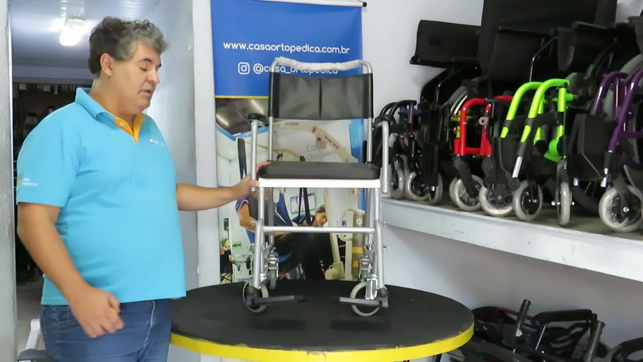 Cadeira higiênica Praxis Columbus - Carga 100  kg - braços articulados - pés removíveis - coletor