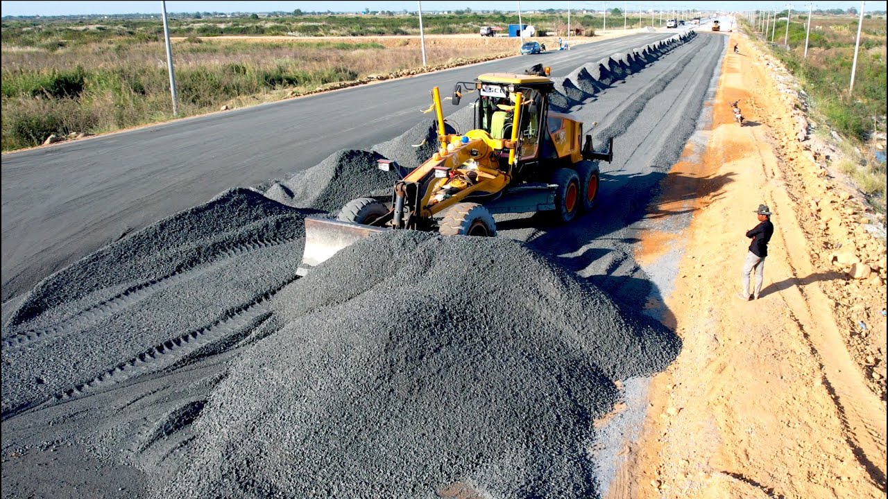 Wonderful Building Foundation New Road Construction By Motor Grader Pushing And Spreading Gravel