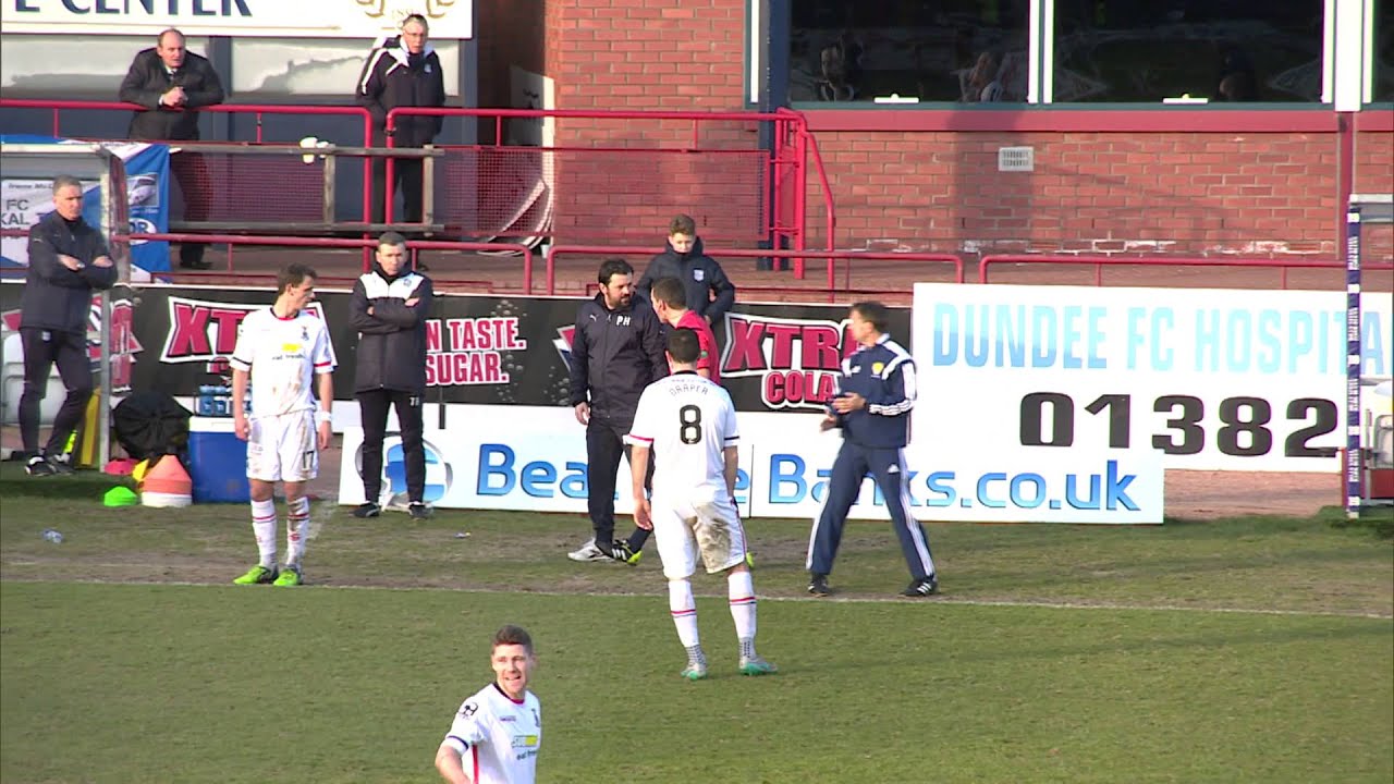 Manager handball stops play at Dens!