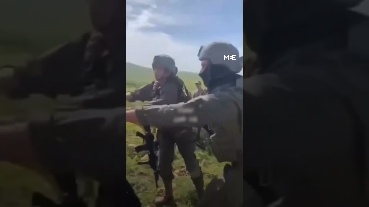 Palestinian woman confronts Israeli settlers and soldiers on her land