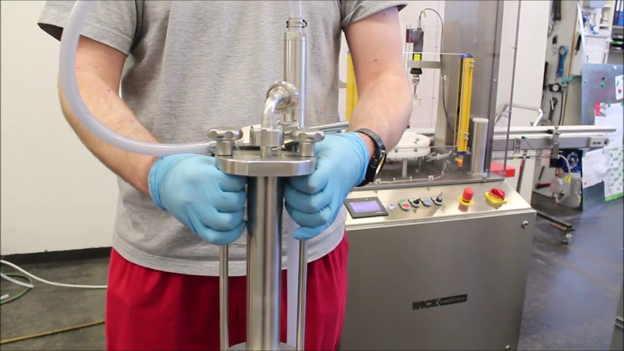 filling machine with capping machine Minican 50 for round bottles with servo piston filler