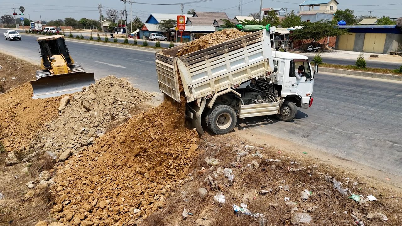 Starting New Project Landfill With Komatsu DR51PX Bulldozer Pushing Soil & 5Ton Truck Unloading soil