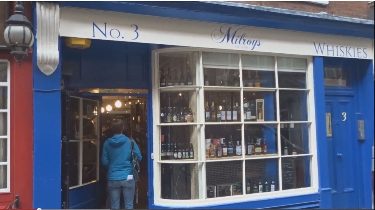 Visiting whisky store Milroy's of Soho in London, UK