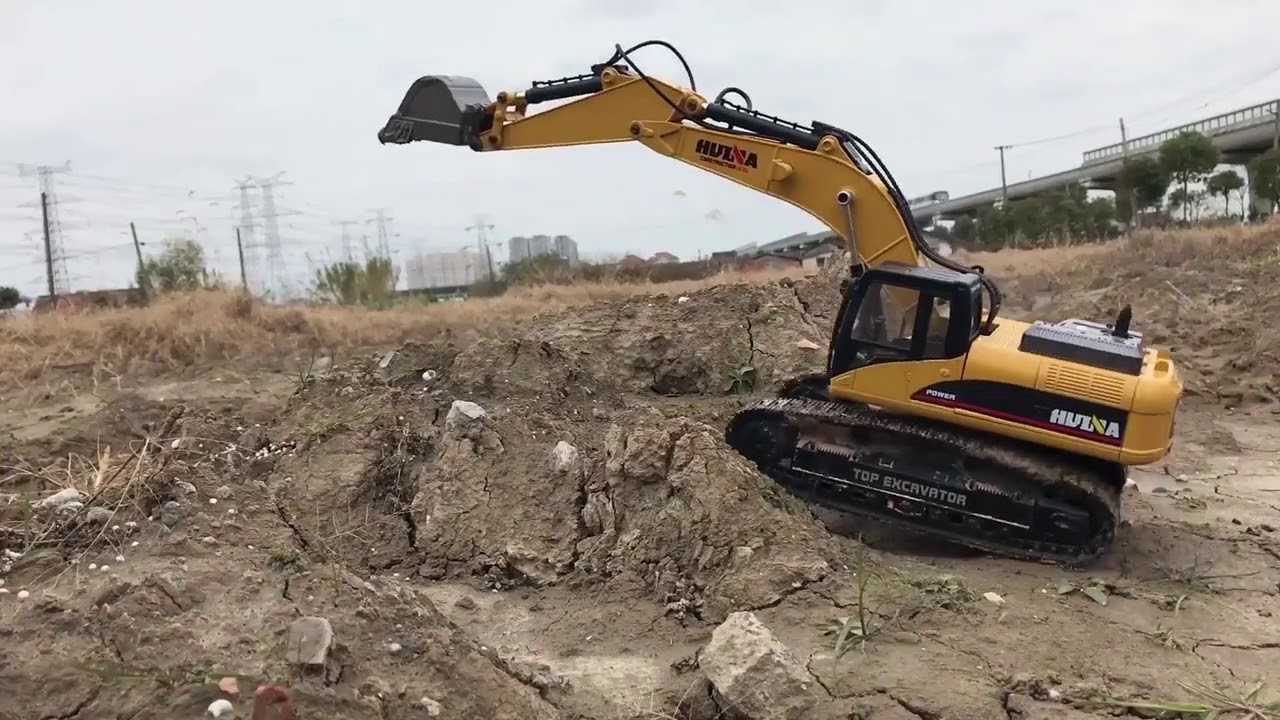 Huina 580 1/14th scale 23 Channel RC Excavator, Timber Grab and Drill