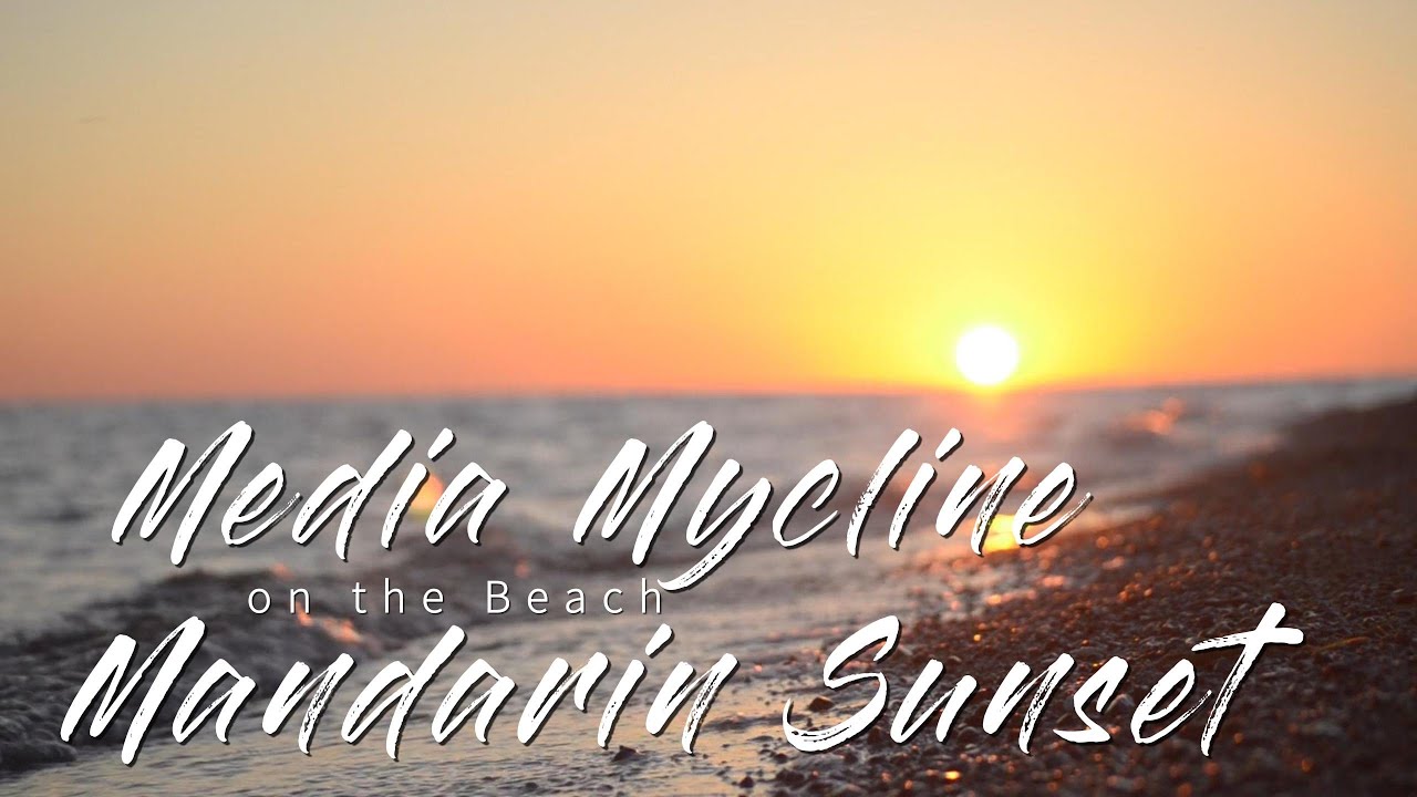 Mandarin Sunset on the Beach: A Spectacular Escape