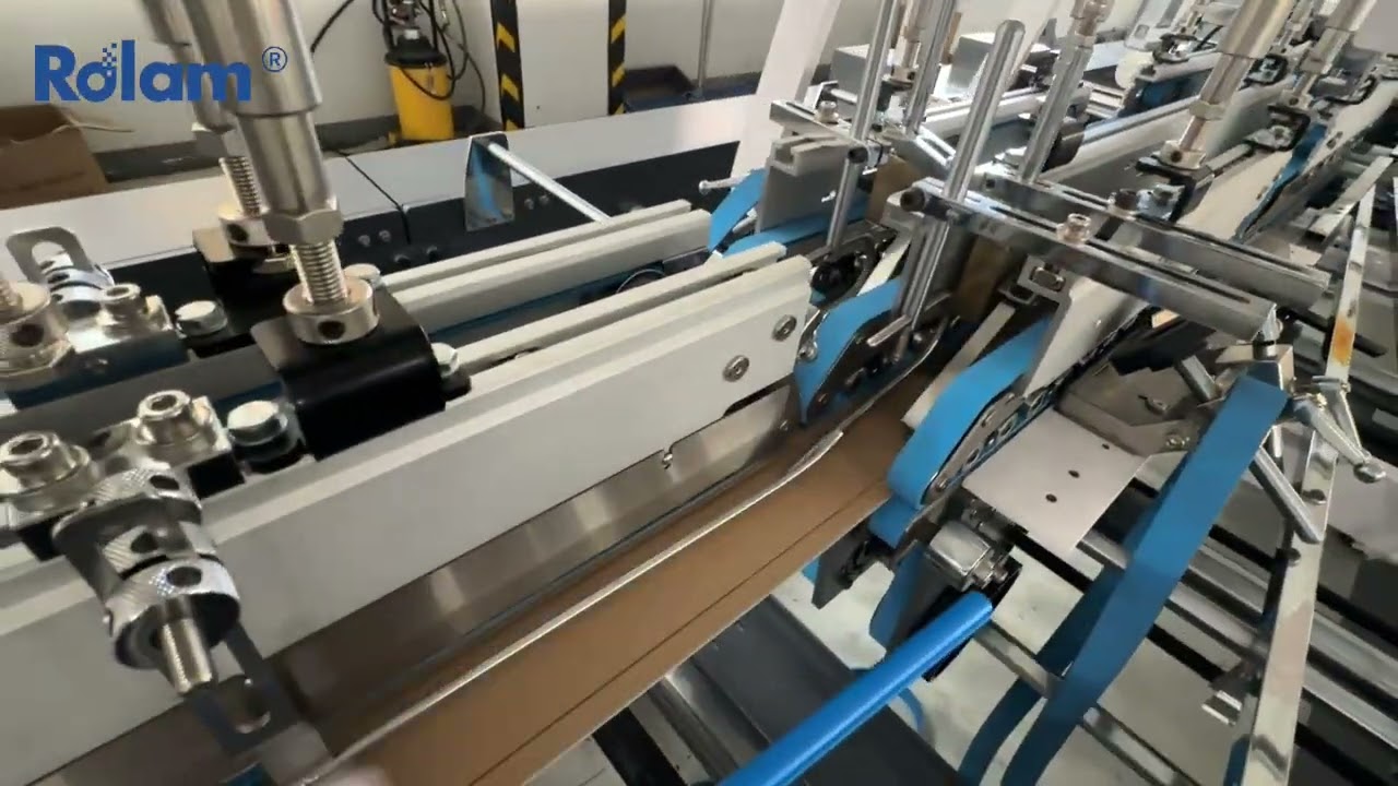 Rolam 1100LCS Automatic folding gluer testing with small corrugated bottom lock cartons