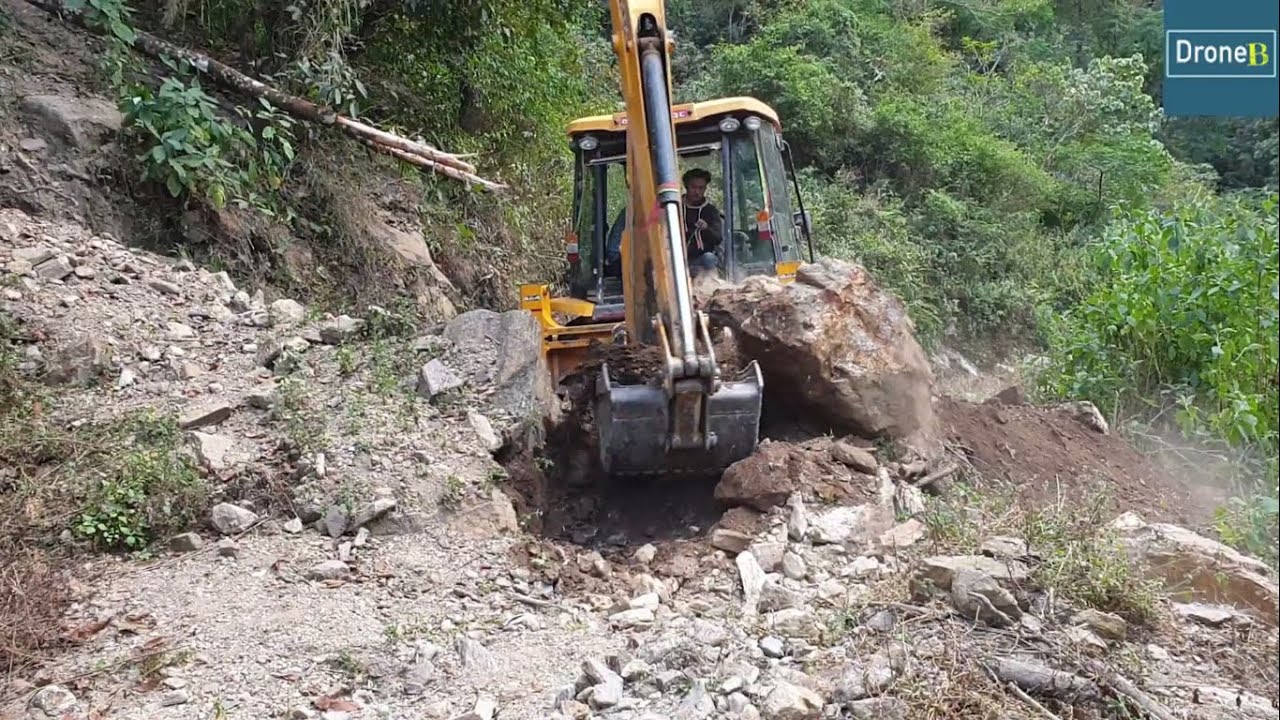 Stone and Landslide Clearing-JCB Backhoe Loader-Hilly Road Work