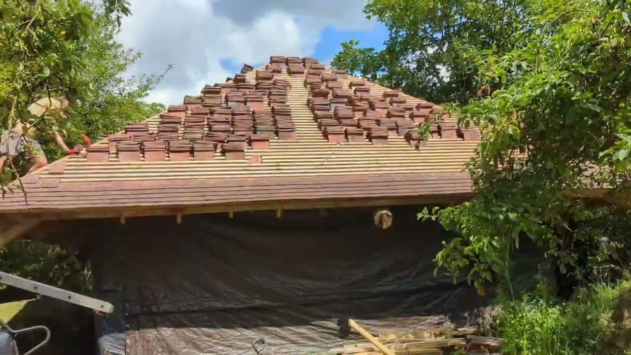 Laying the roof tiles