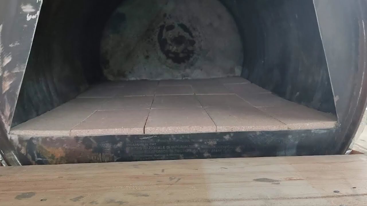 forno a legna con fusto olio
