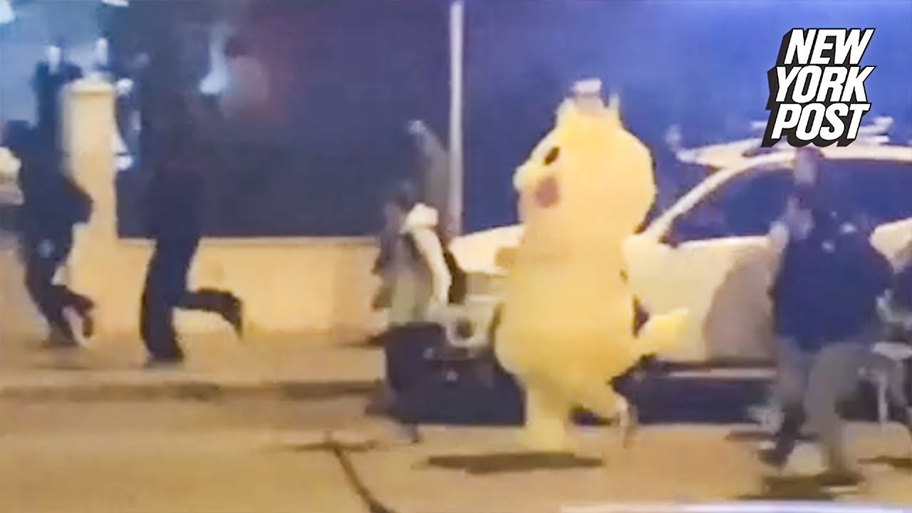 Bizarre moment person in Pikachu costume flees Police amid protests in Turkey