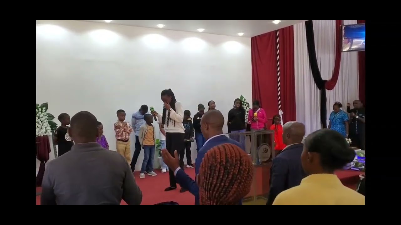 Joyanna Chebet Leading Worship with the Children in Church 