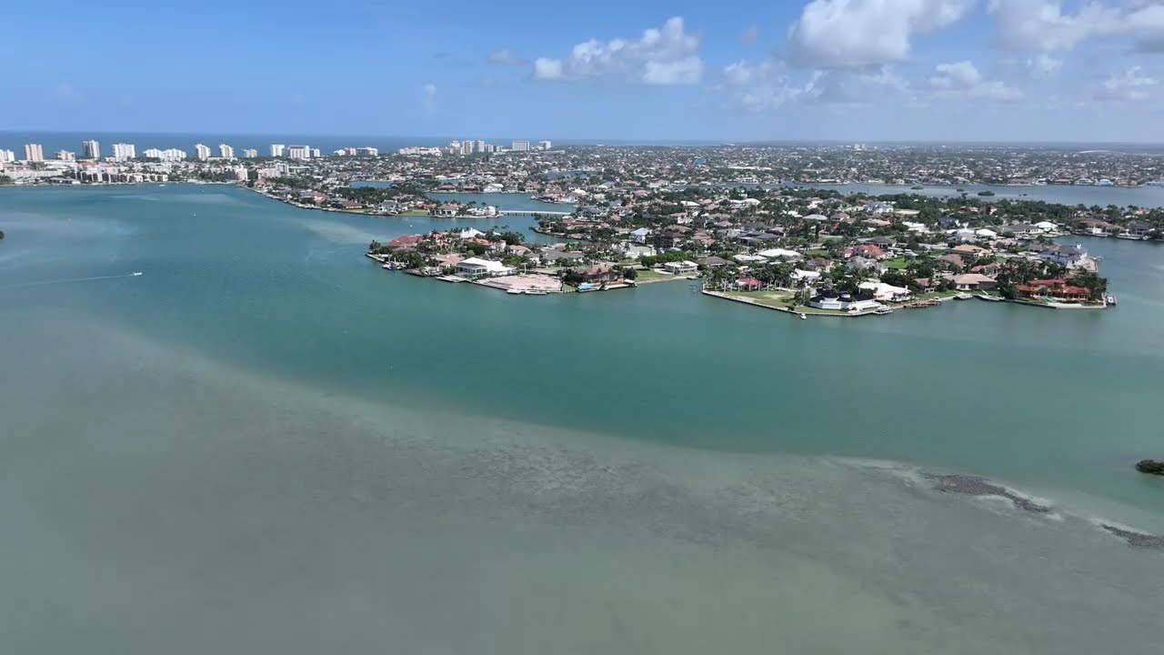 5 Naples Drone flies over 10000 Island from S Barfield Ave Marco Island over Caxambas Pass