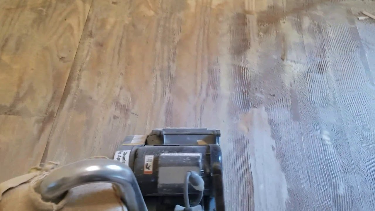 How to remove glue from subfloor