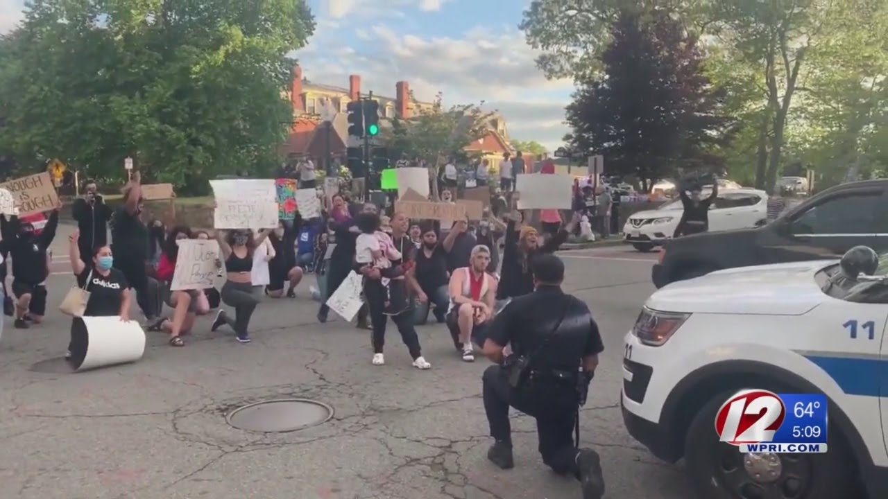 New Bedford police officer joins protesters