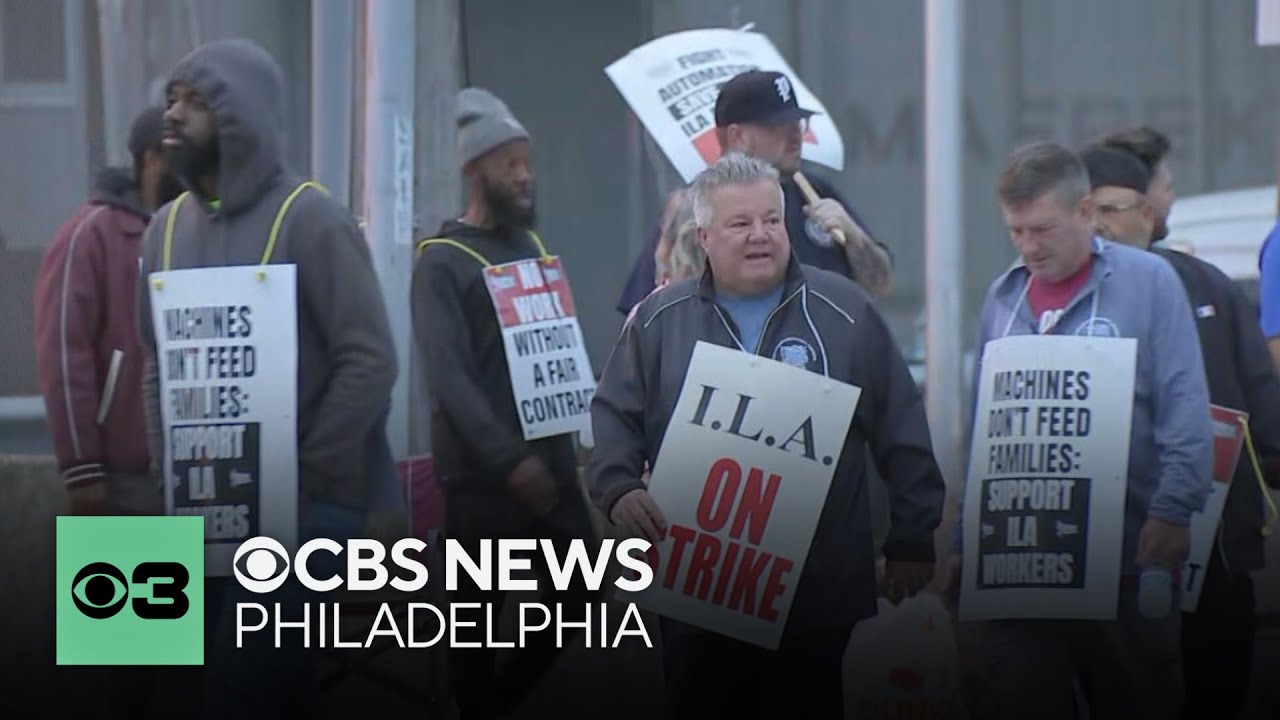 Dockworkers hit the picket line in Philadelphia as port strike starts along the East and Gulf coasts