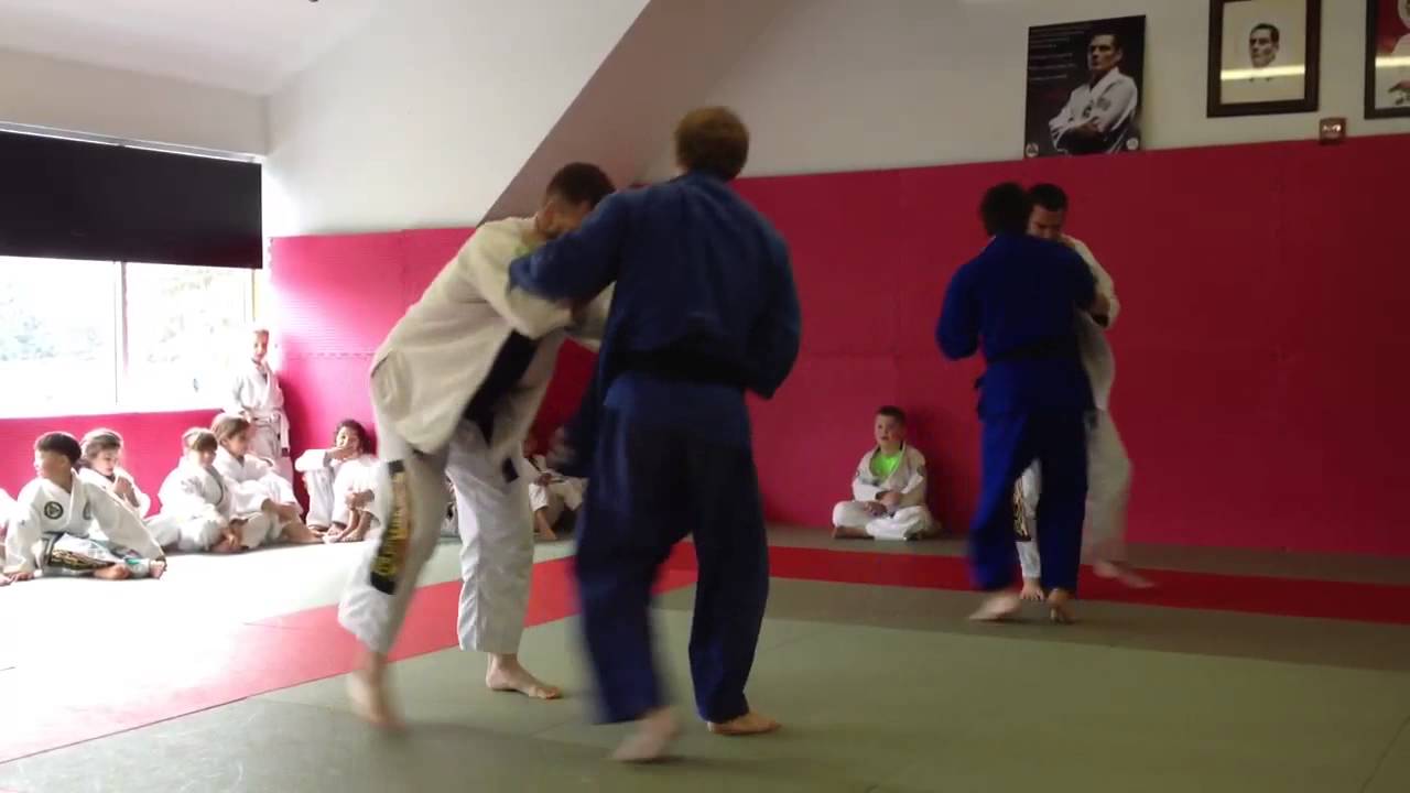 BJJ Purple Belt having fun with Judo Black Belt
