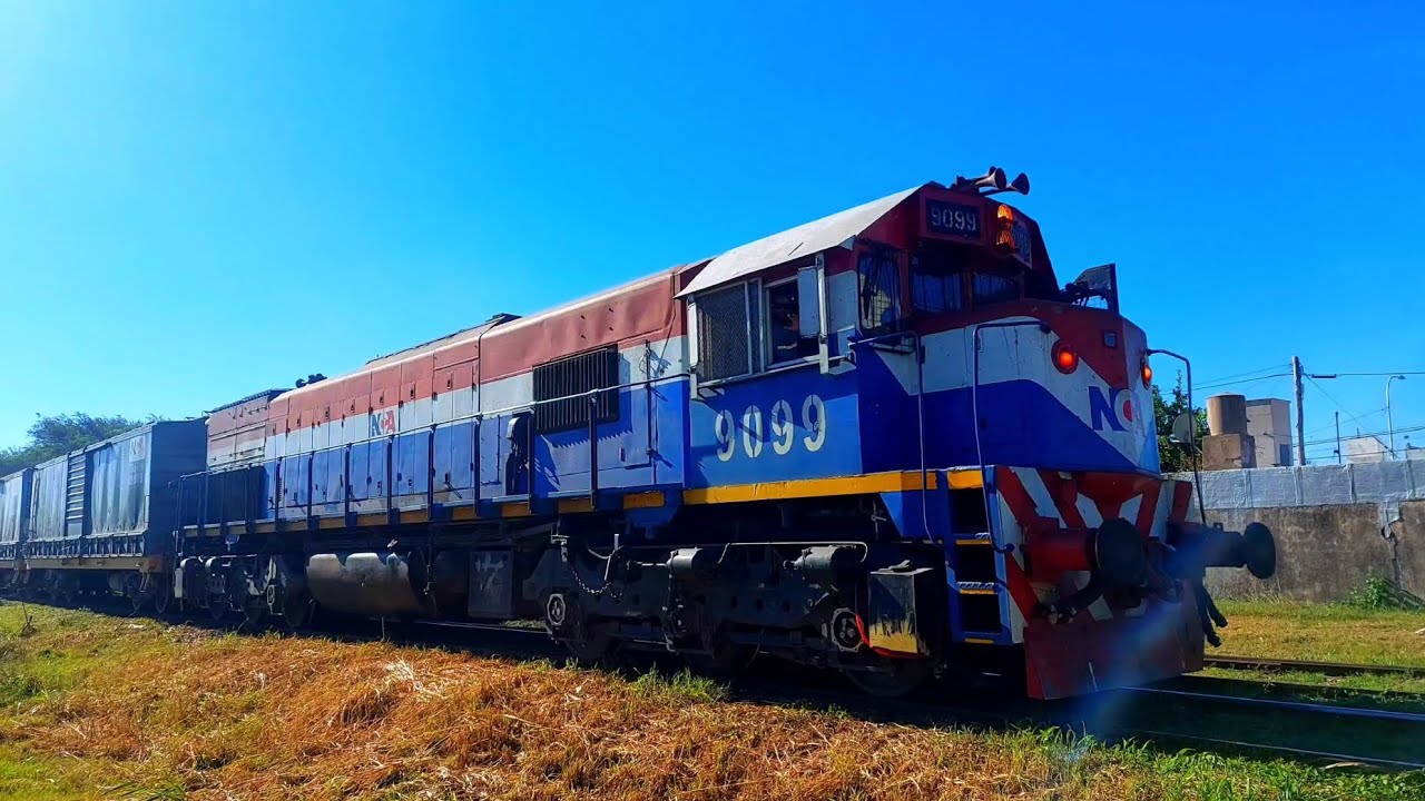 [4K] Tren cargado de NCA con la EMD GT-22CW 9099 pasando por Marcos Juárez!!!!!!
