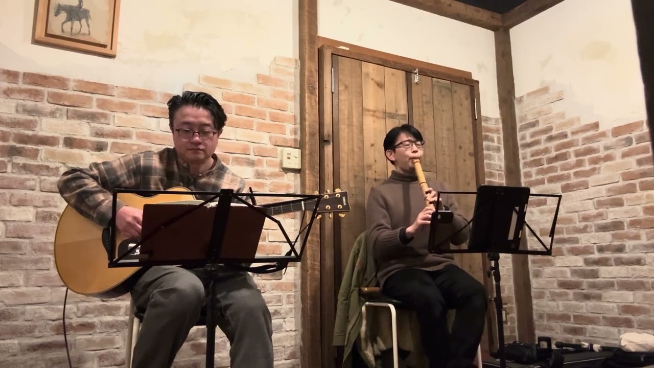 Brun with a Japanese flute player