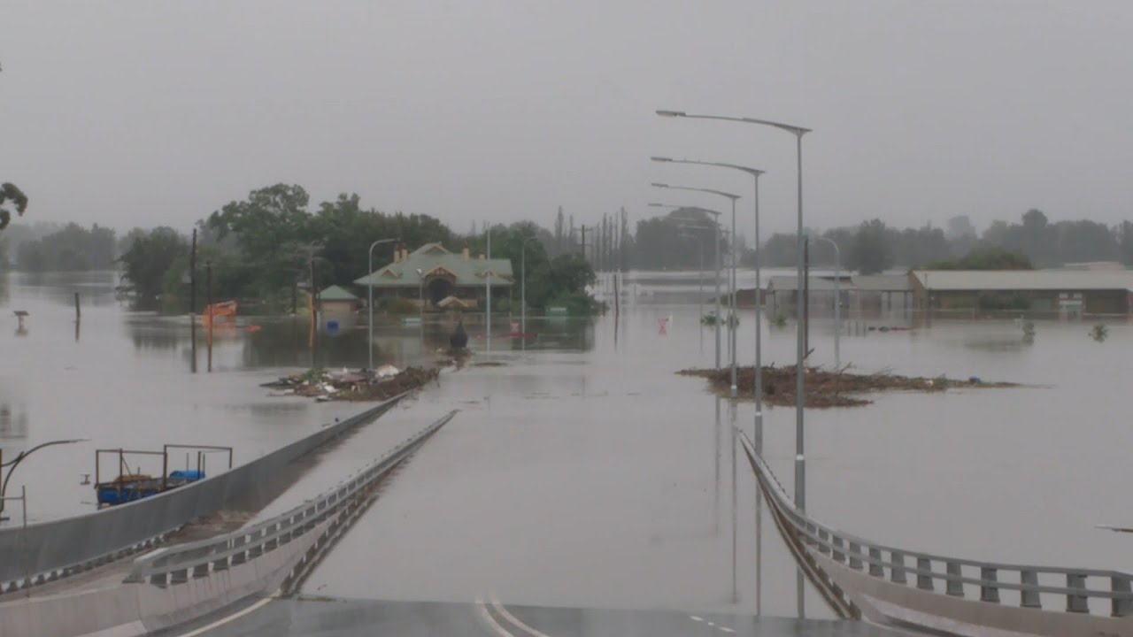Bridge submerged as Australian flooding disaster worsens | AFP