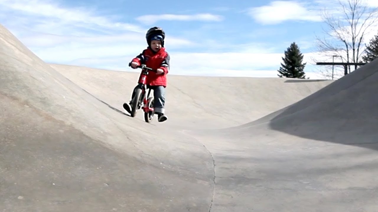 A 3 year old and his Strider bike in the skate park (Strider bikes rule!)