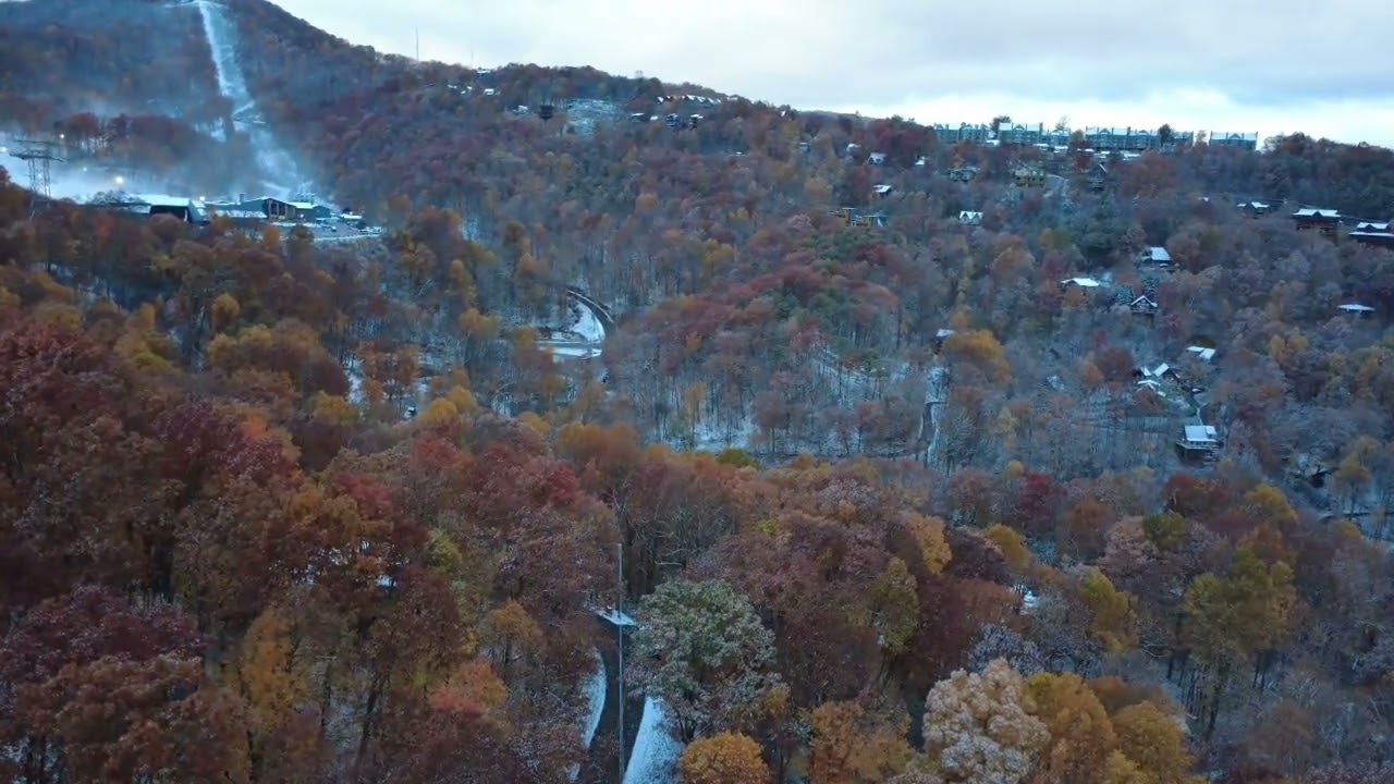 Drone footage. Gatlinburg 11/10/25. Fall foliage and snow.