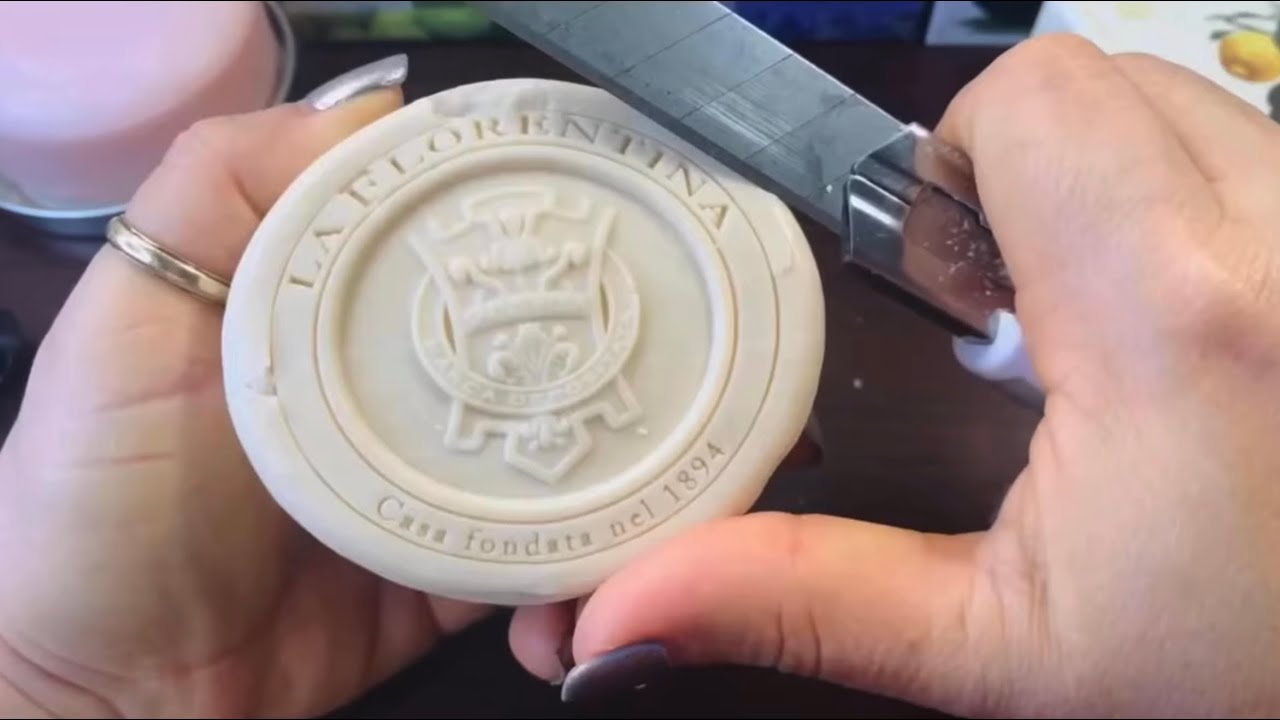 CUTTING BROWN AND ROUND BAR SOAPS 
