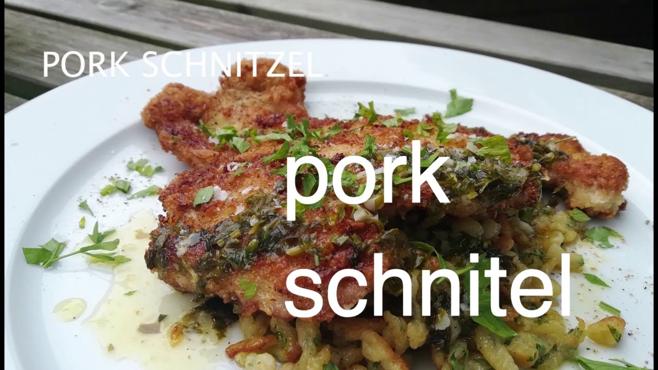 succulent crunchy Pork Schnitzel, classic Austrian fried breaded pork