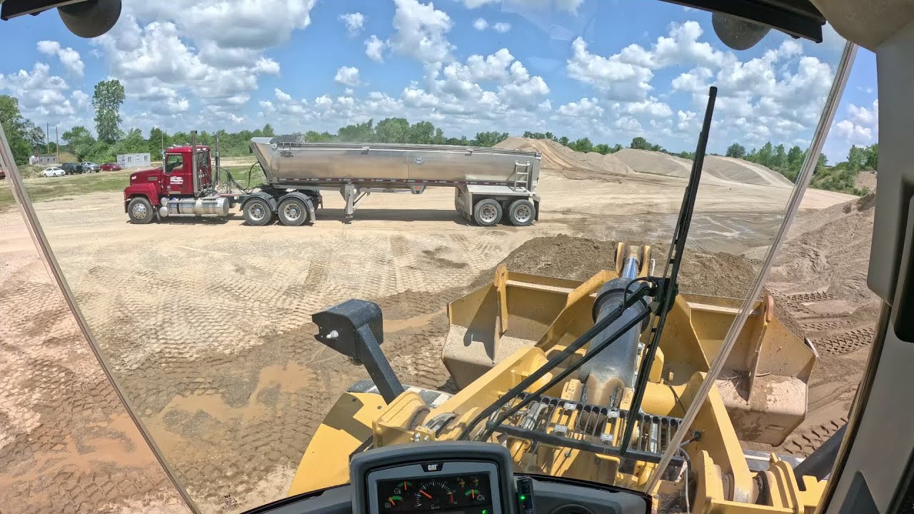 CAT 972M Loading trucks, stockpiling and some helpful advice.
