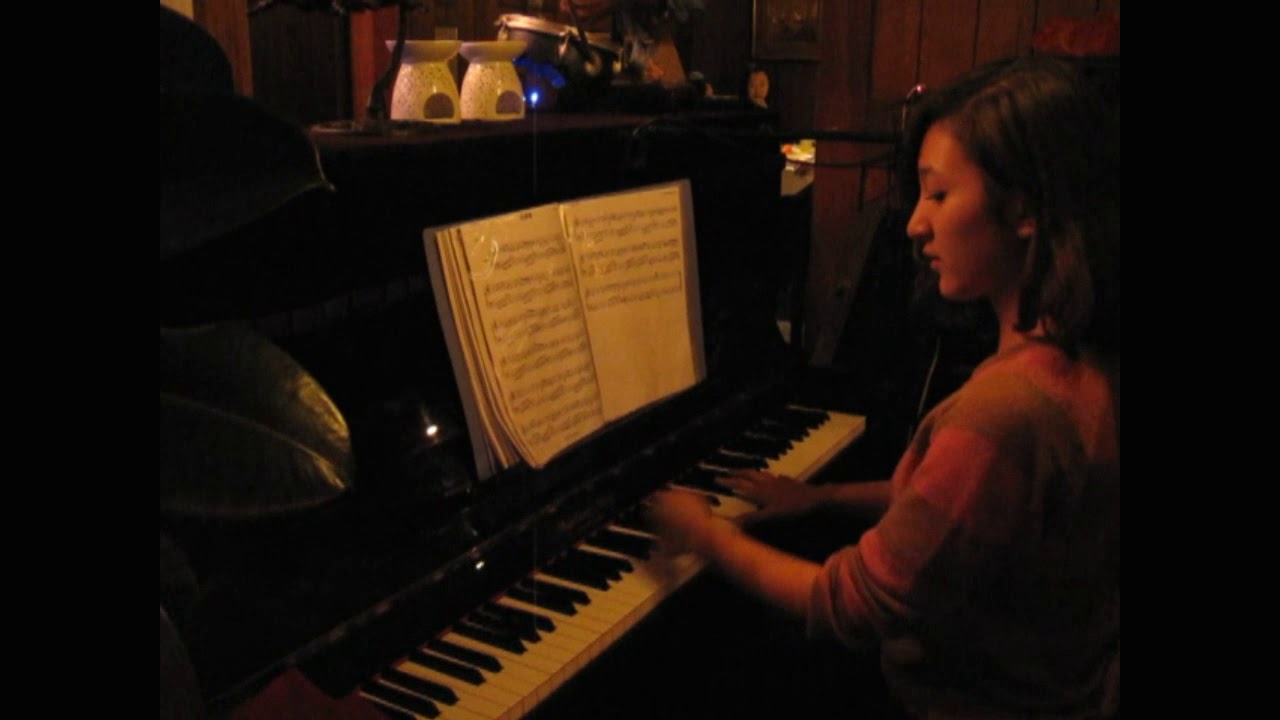 Lily playing at Cafe Roland in Qingdao