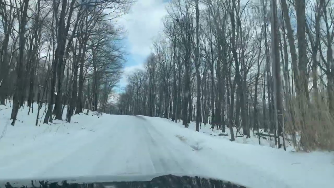 Snowy road end of February 