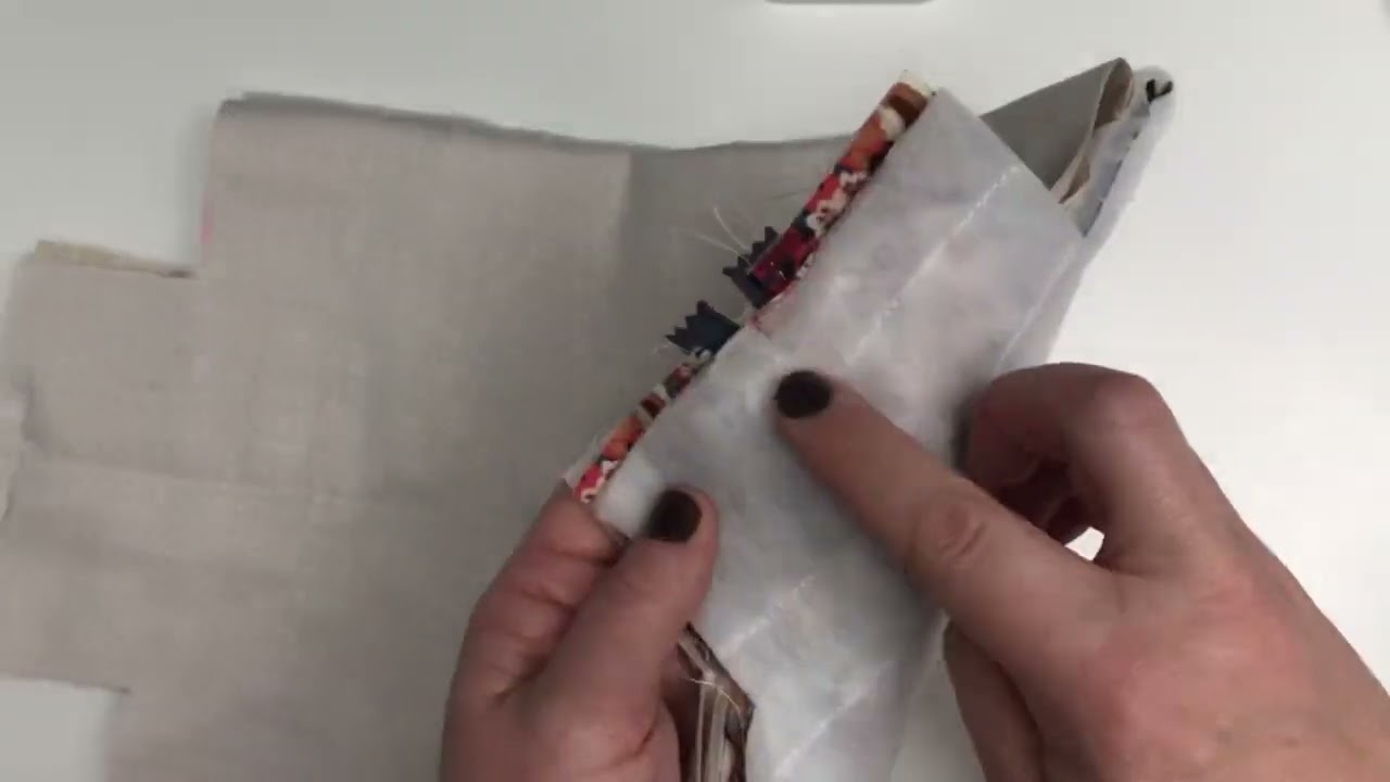 Coudre une trousse matelassée, sans couture visible.