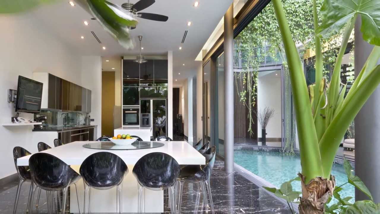 Natural ventilation and a forest cocoon contribute to the passive design of this house
