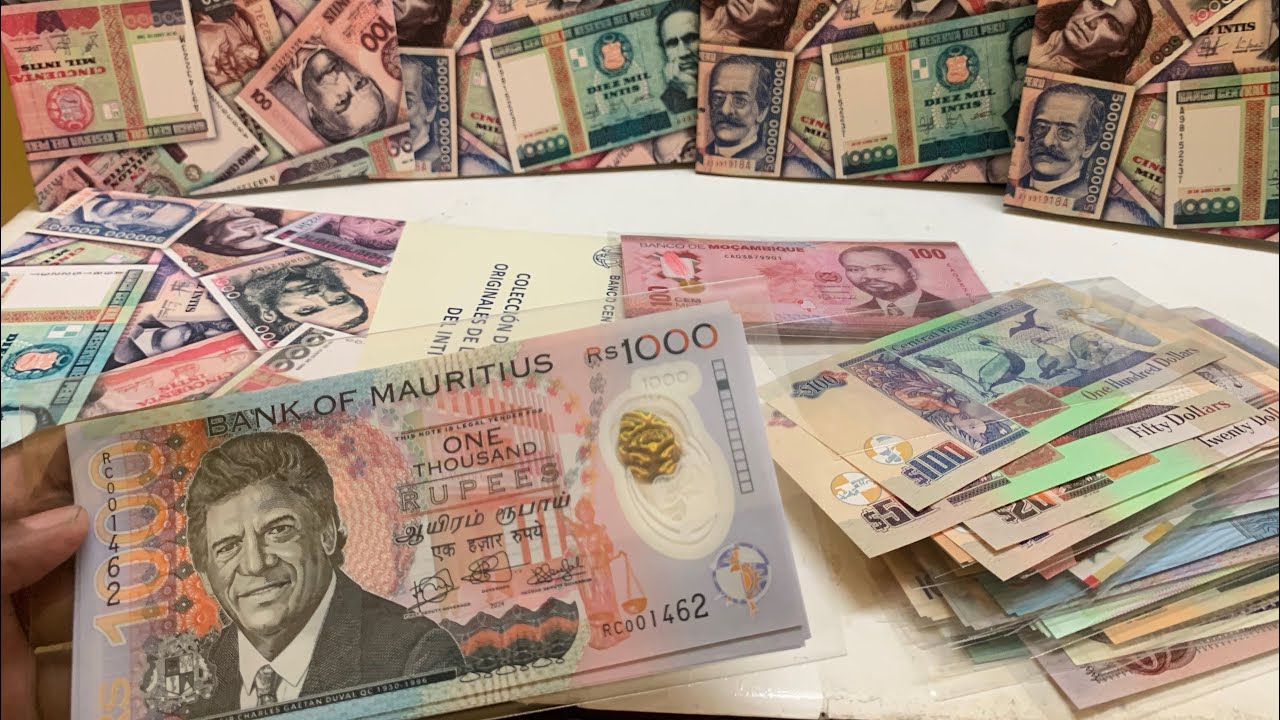 Table full of currency - colourful bank note collection - my hobby