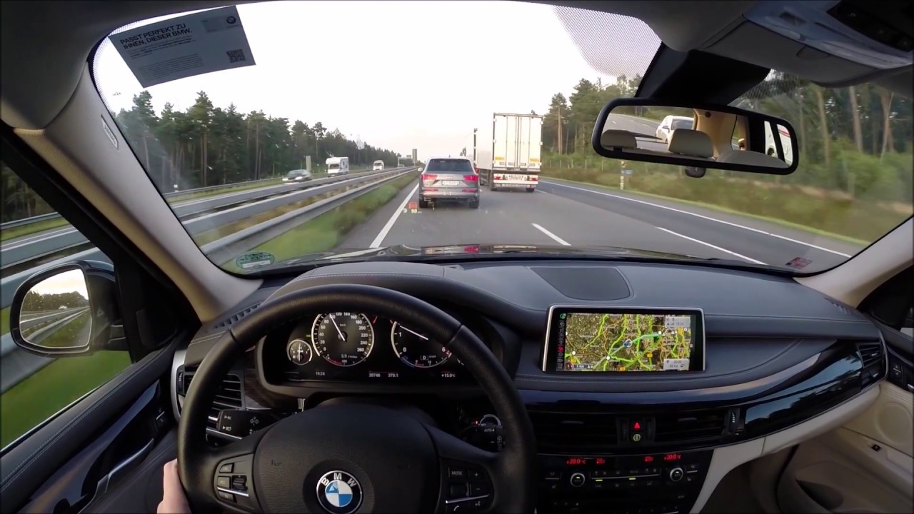 The co-drivers view: fast drive with BMW X5 on Autobahn A1 POV