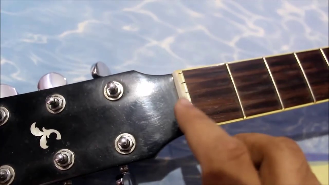 Change Acoustic Guitar Strings at Home - Make Righty Guitar Lefty