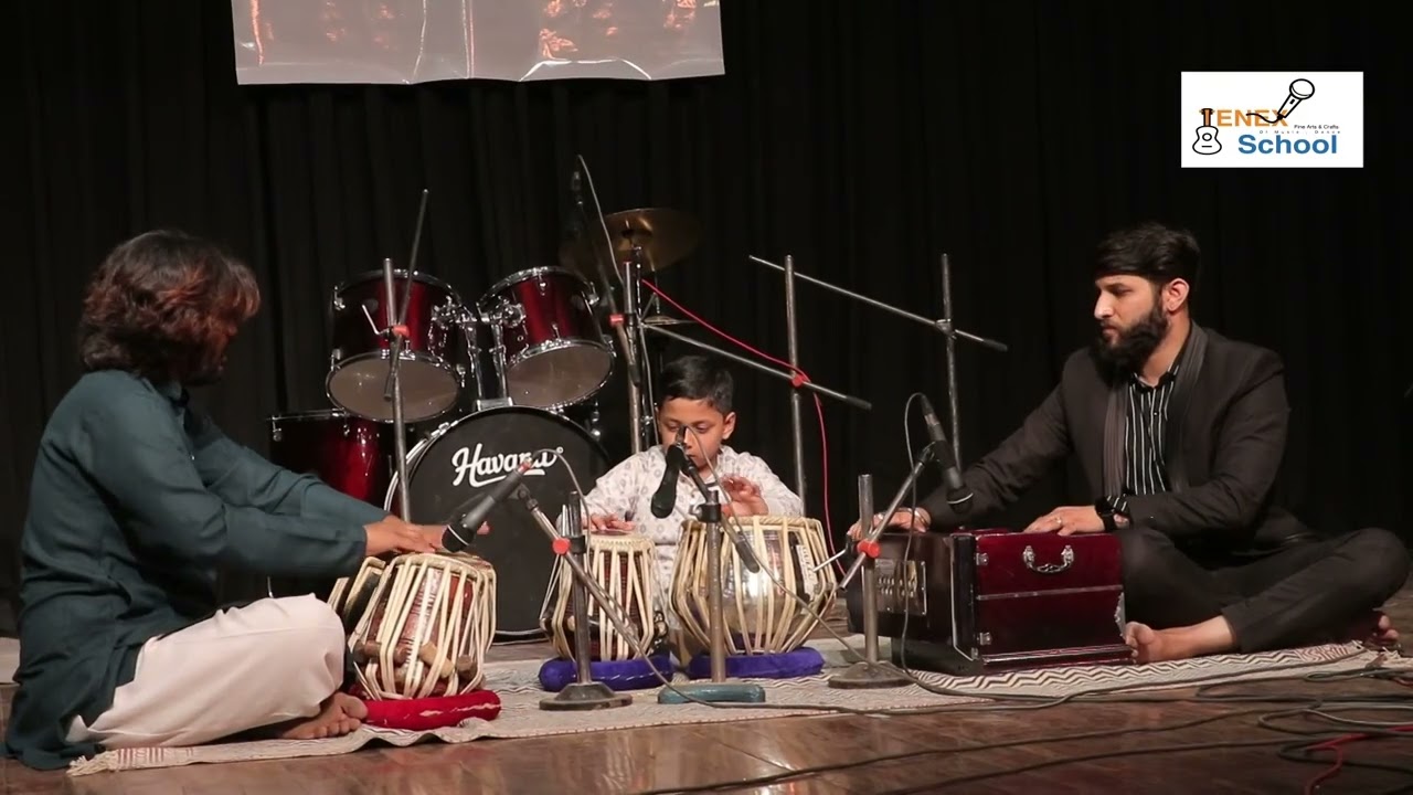 This's the first stage performance of this child the child has played the tabla in a very lovely way