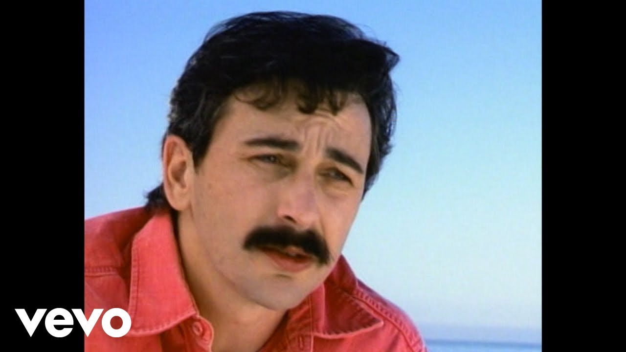 Aaron Tippin - I Wonder How Far It Is Over You (Official Video)