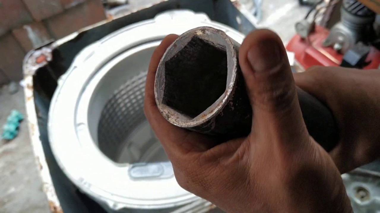 Herramienta para sacar tuerca del tambor de lavadora