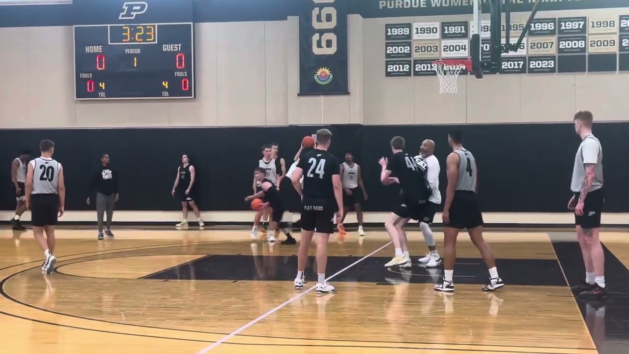 Daniel Jacobsen makes hook shot in summer practice.
