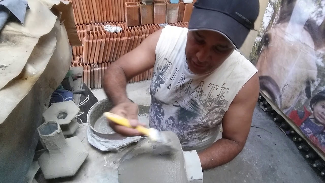 Vasos de caixas de leite feito no cimento - acabamento