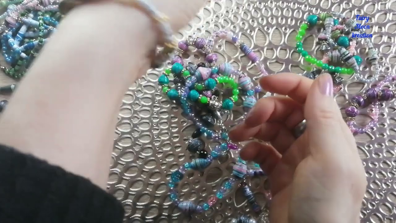 Neue Papierperlen zu schönen Armbänder gestaltet