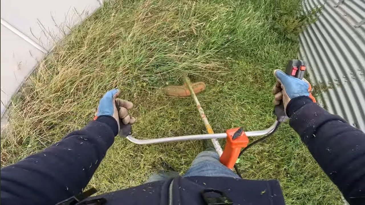 Husqvarna 535RX durability test in very tall and thick grass POV.