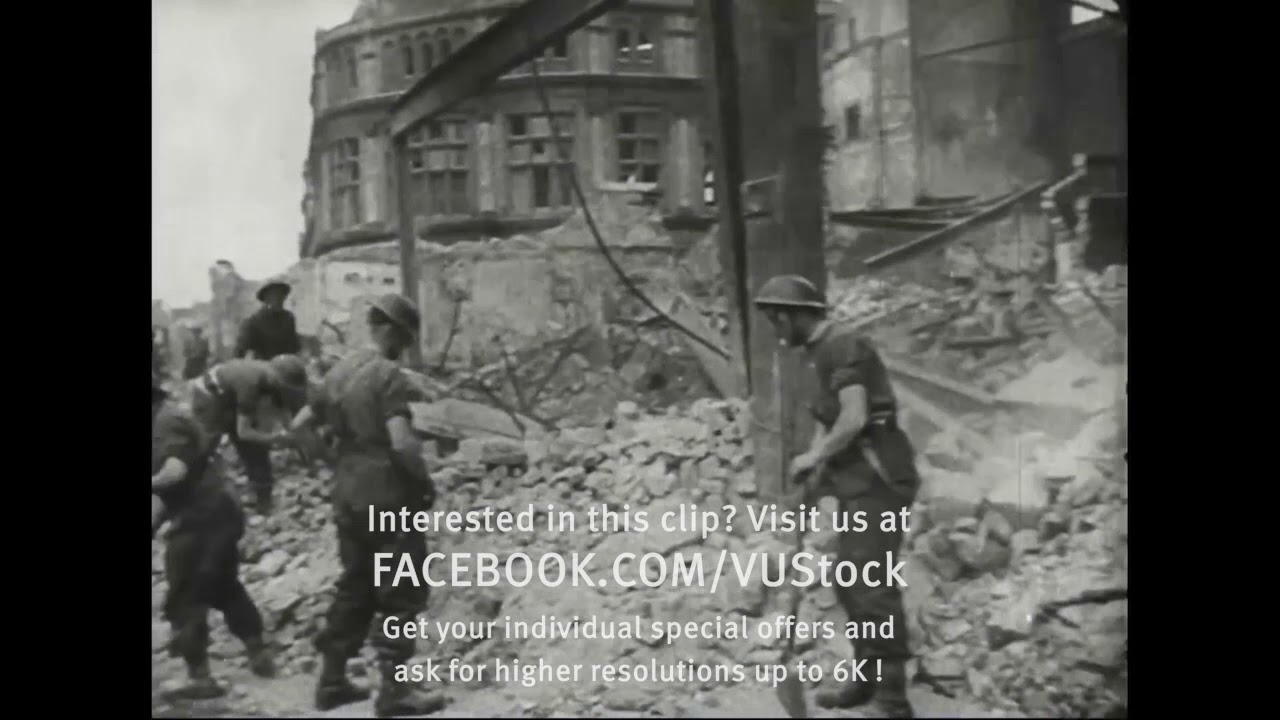British soldiers clear up after German attack on London