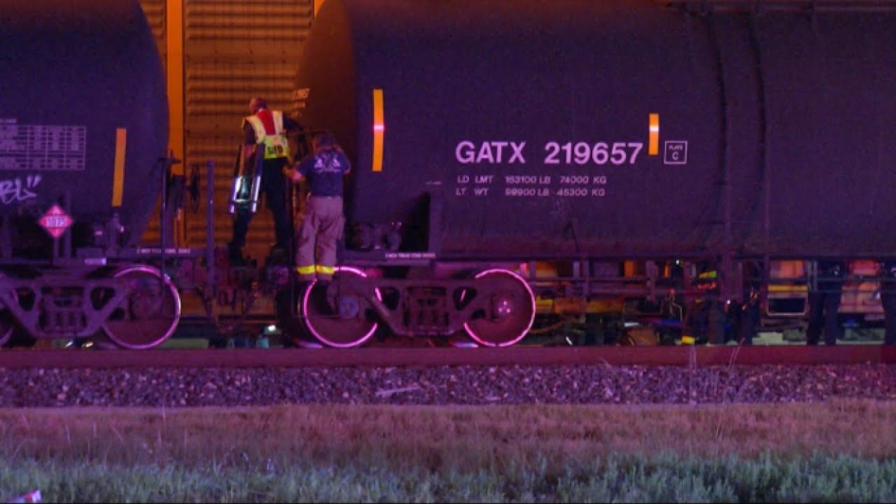 Man caught in freight train door travels 15 miles, dangling by his foot